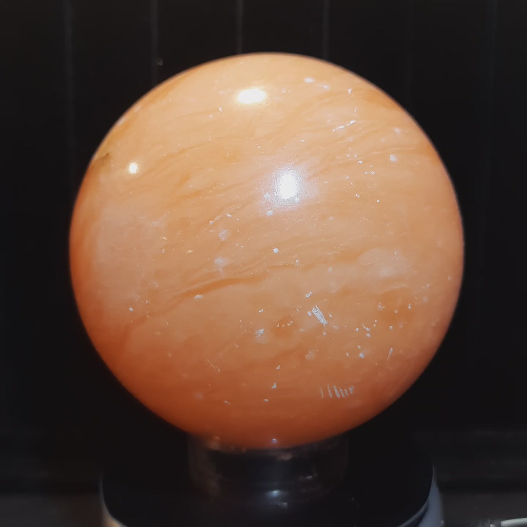 Orange Calcite Sphere 920 grams.